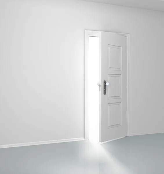 Graue Wand mit geöffneter Tür — Stockfoto