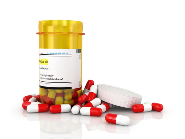 Pills spilling out of pill bottle isolated on white. — Stock Photo, Image