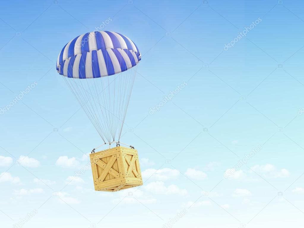 Concept of fast delivery. Wooden box falling on the parachute on