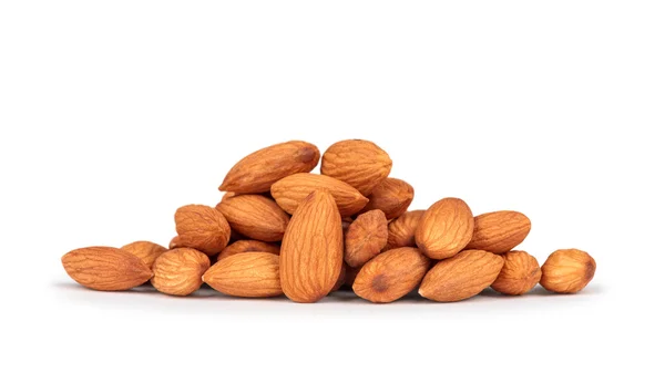 Almonds in heap over white background — Stock Photo, Image