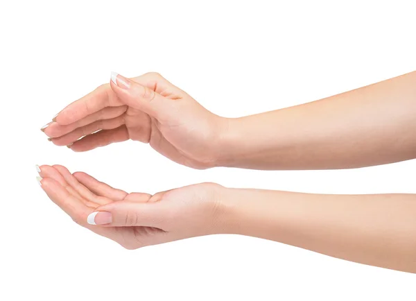 Due mani proteggono qualcosa di isolato sul bianco . — Foto Stock