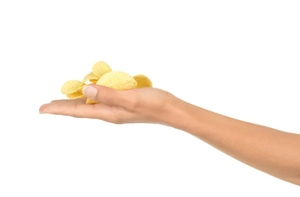 Hand håller potatischips — Stockfoto