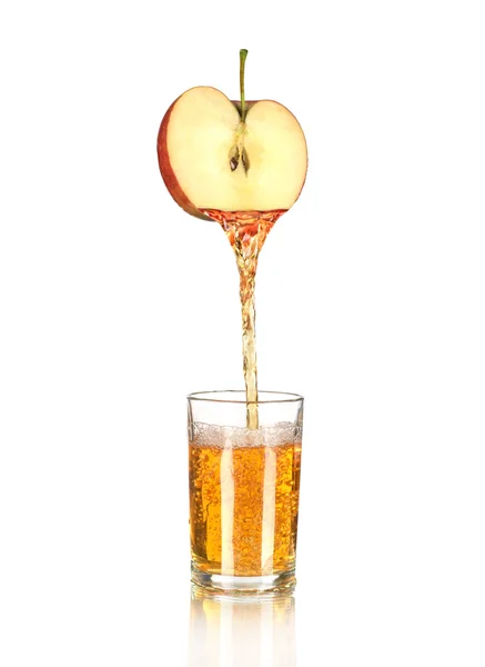 Apple Juice pouring into glass isolated on white — Stock Photo, Image