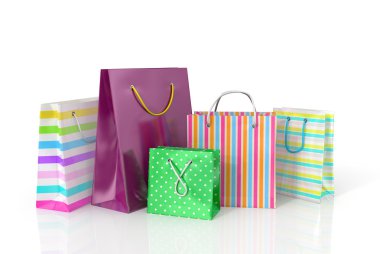 Colorful paper bags for shopping on a white background. clipart