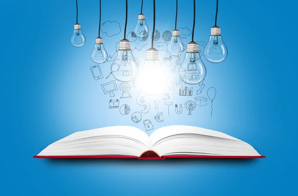 Livre ouvert avec des lampes brillantes — Photo