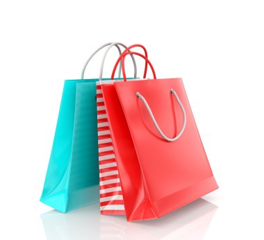 Three colored paper bag on a white background. clipart