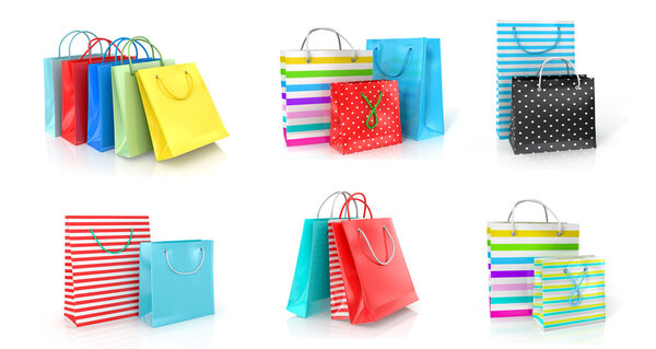 Collection of colored paper bags on a white background.