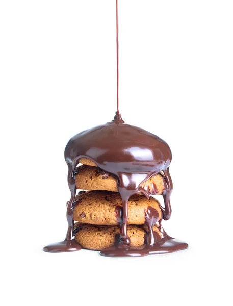 Close up of a chocolate syrup on a cake on white background — Stock Photo, Image