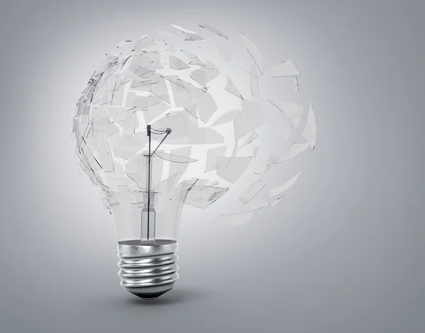 Concept of a utopian idea. Broken light bulb on a white backgrou — Stock Photo, Image