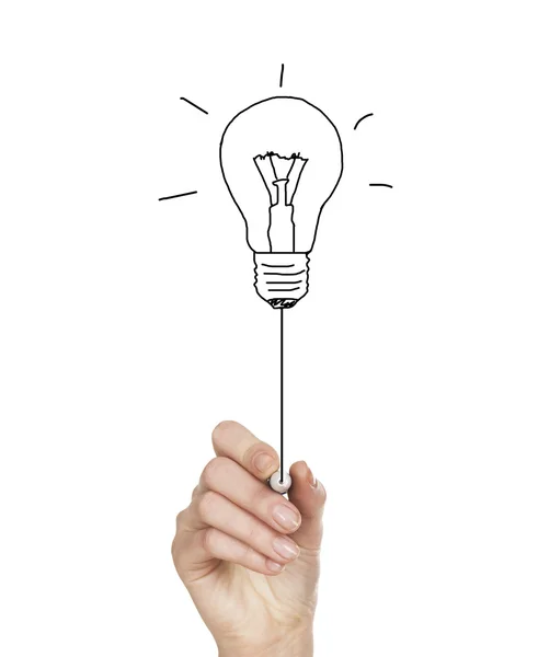 Mão desenha uma lâmpada, o símbolo da ideia — Fotografia de Stock