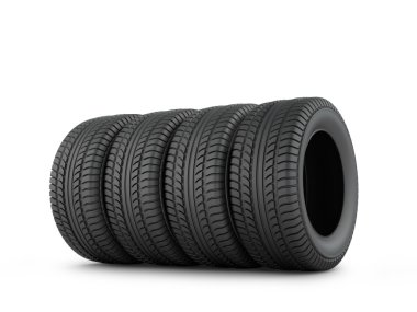 Beyaz bir arka plan üzerinde dört siyah kauçuk lastik.