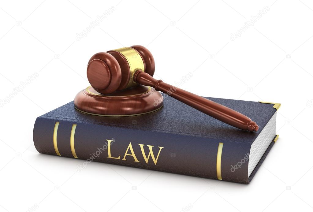 Concept of law. The wooden gavel with book of law on a white bac