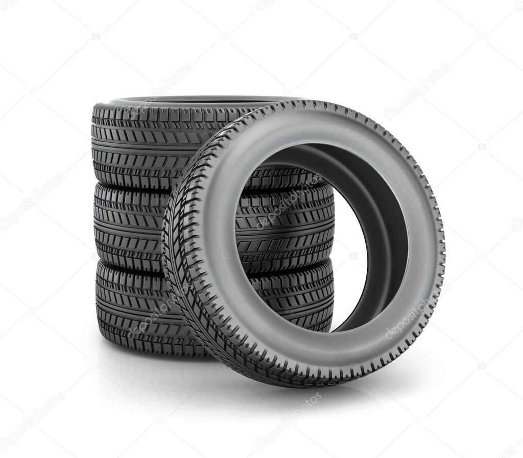 Stack of four wheel new black tyres for  car isolated on white b