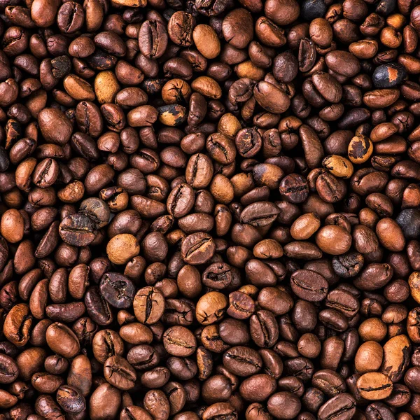 Granos de café tostados, se puede utilizar como fondo — Foto de Stock