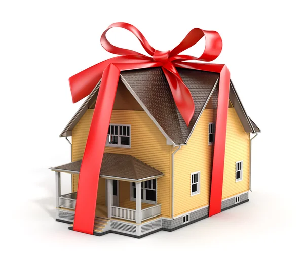 Real estate concept. House architectural model with red bow on a — Stock Photo, Image