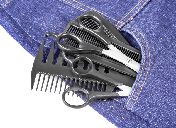 Calça jeans azul e acessórios de cabelo ferramenta — Fotografia de Stock