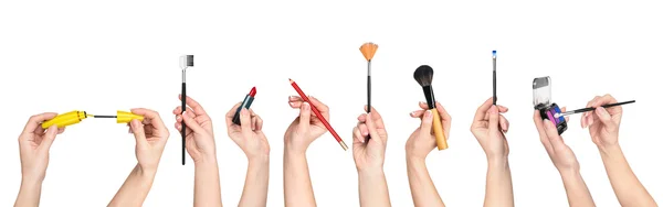 Collectie van handen met tools voor make-up geïsoleerd op witte b — Stockfoto