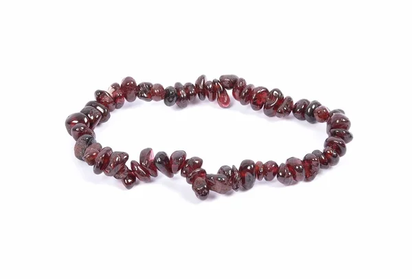 Splintered garnet chain on white background — Stock Photo, Image