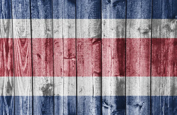 Flag on weathered wood — Stock Photo, Image