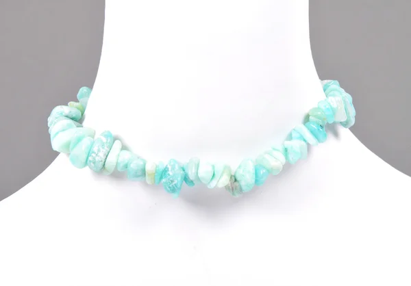 Splintered amazonite chain on bust — Stock Photo, Image