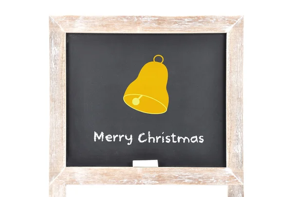 Salutations de Noël avec cloche sur tableau noir — Photo