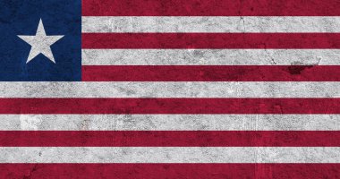 Yıpranmış betonun üzerinde Liberya bayrağı