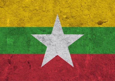 Yıpranmış betonun üzerinde Myanmar bayrağı