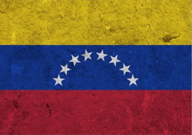 Yıpranmış betonun üzerinde Venezuela bayrağı