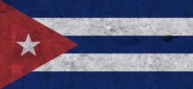 Yıpranmış betonun üzerinde Küba bayrağı
