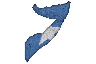 Yıpranmış beton üzerinde Somali haritası ve bayrağı