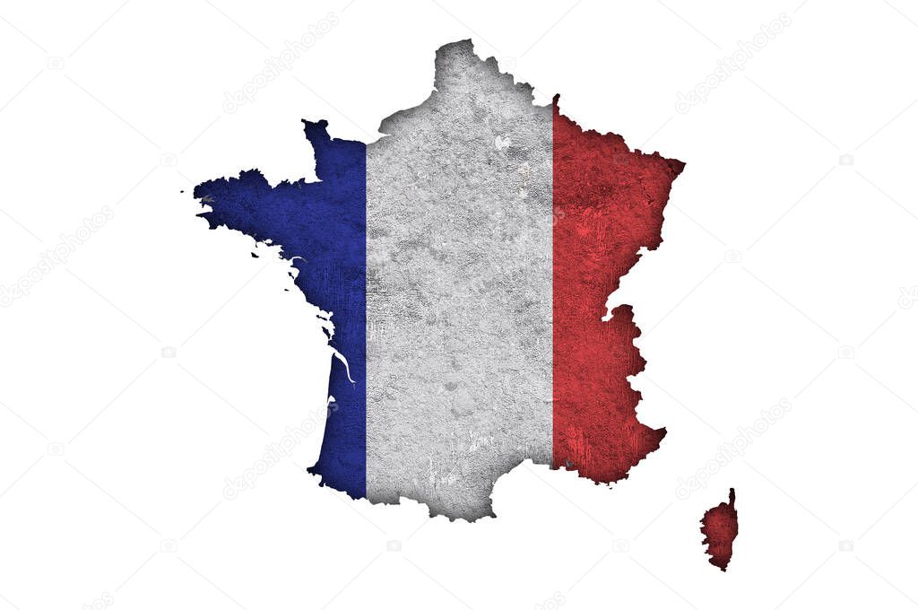 Map and flag of France on weathered concrete