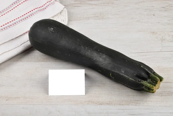 Zucchini and card — Stock Photo, Image