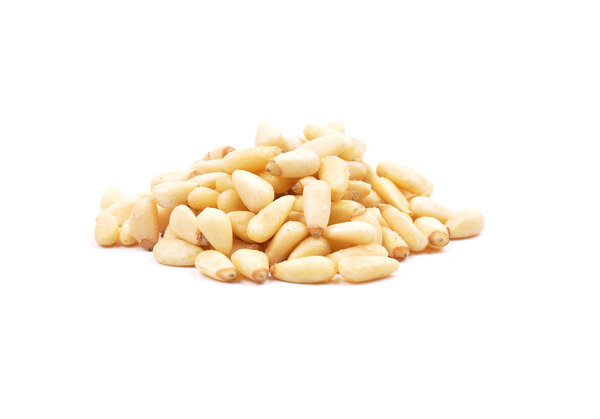 Pine nuts on white