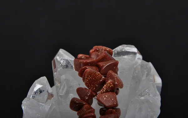 Goldstone on rock crystal — Stock Photo, Image