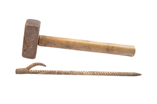 Sledge hammer and iron rod — Stock Photo, Image