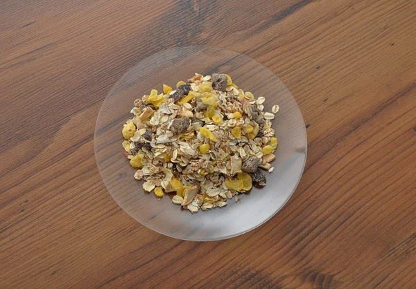 Placa de vidro com muesli — Fotografia de Stock