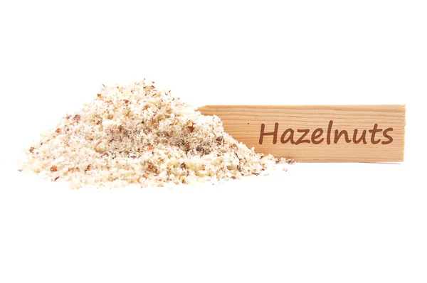 Hazelnuts powdered and plate — Stock Photo, Image