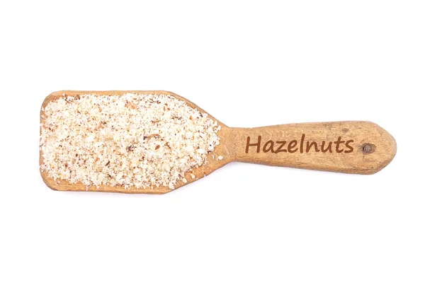 Hazelnuts powdered on shovel — Stock Photo, Image