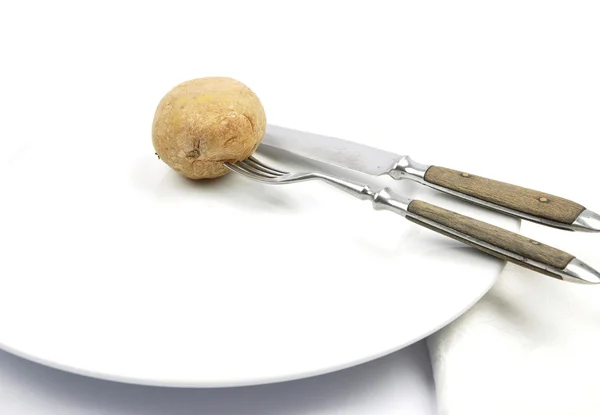 Potato with peel on table — Stock Photo, Image