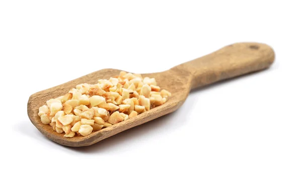 Minced hazelnuts on shovel — Stock Photo, Image