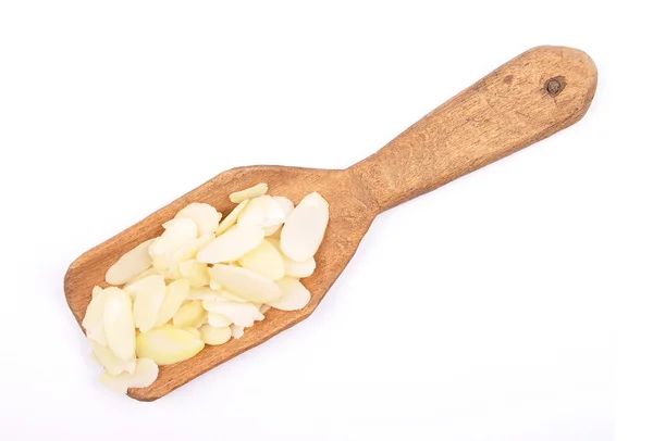 Almond slices on shovel — Stock Photo, Image