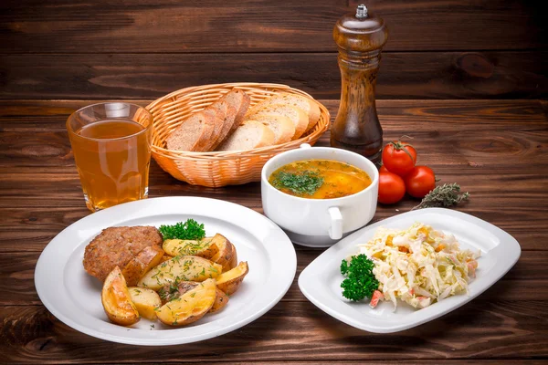 Business lunch with soup, salad and juice — Stock Photo, Image