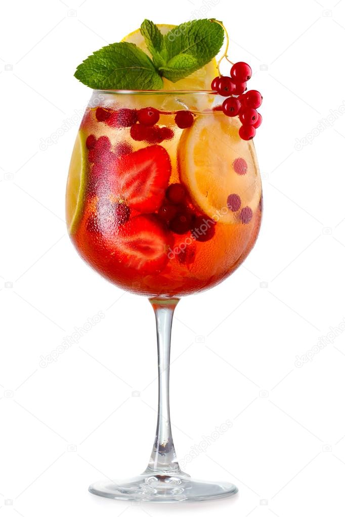Alcohol cocktail with fresh mint, fruits and berries isolated