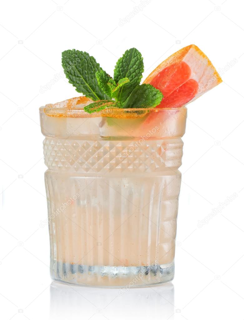 Grapefruit alcohol cocktail with gin isolated on white