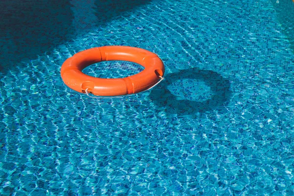 Lifesaver (Life Buoy) belt in water Royalty Free Stock Images