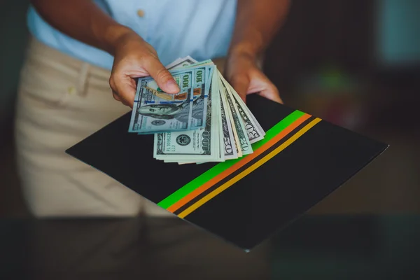 Money in human hands, women giving dollars — Stock Photo, Image