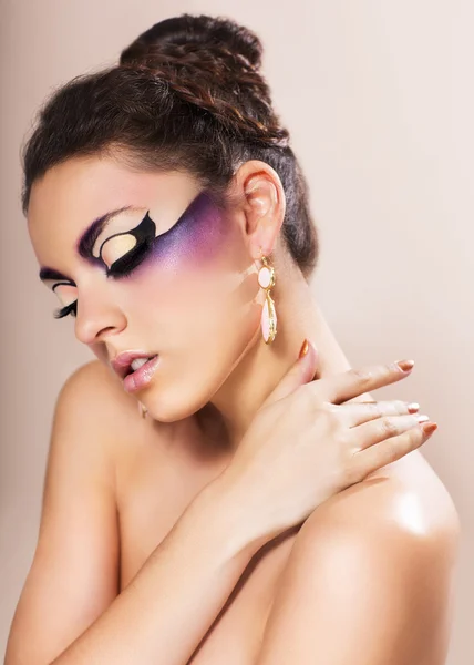 Beautiful young woman with fantasy makeup — Stock Photo, Image