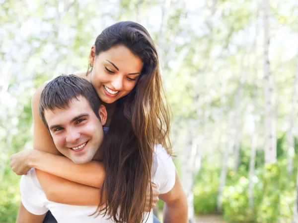 Cute couple in the park on a sunny day Stock Picture