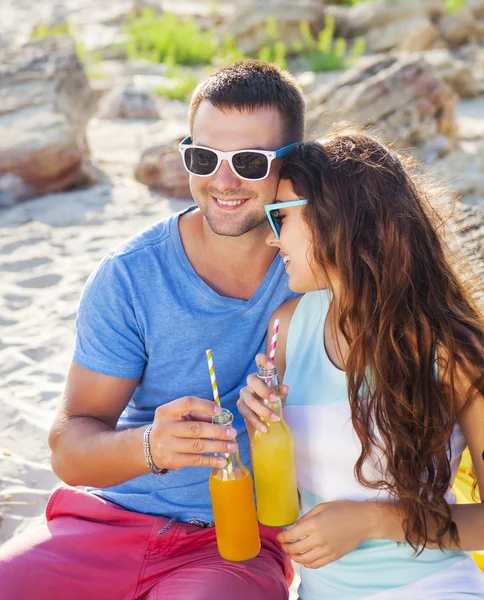 Young happy couple in love at the summer picnic — Stock Photo, Image