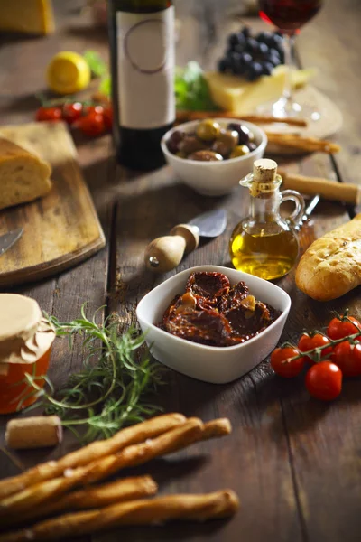 Italian food ingredients on wooden background